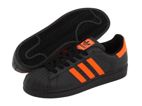 adidas schuhe schwarz mit orang plastik|Orange Sneaker .